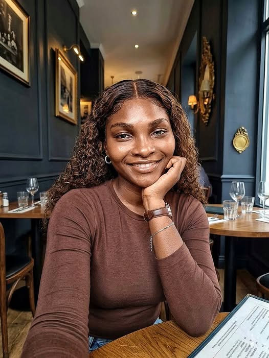 A young lady in a cafe